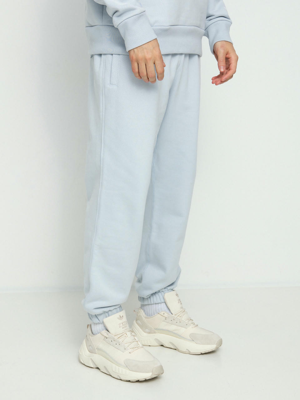 Штани adidas Originals Pharrell Williams Basics (halblu)