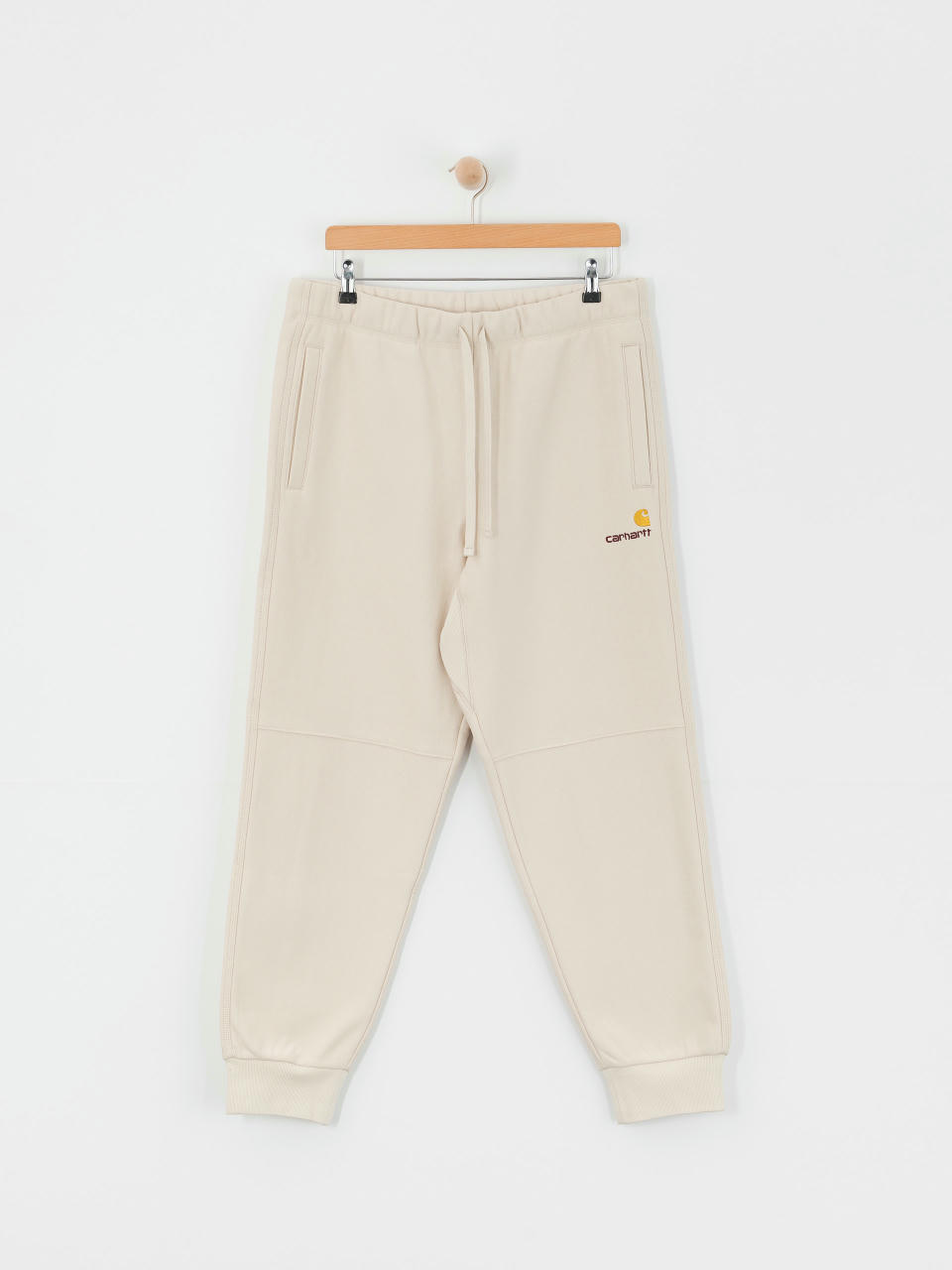 Штани Carhartt WIP American Script Jogging (moonbeam)