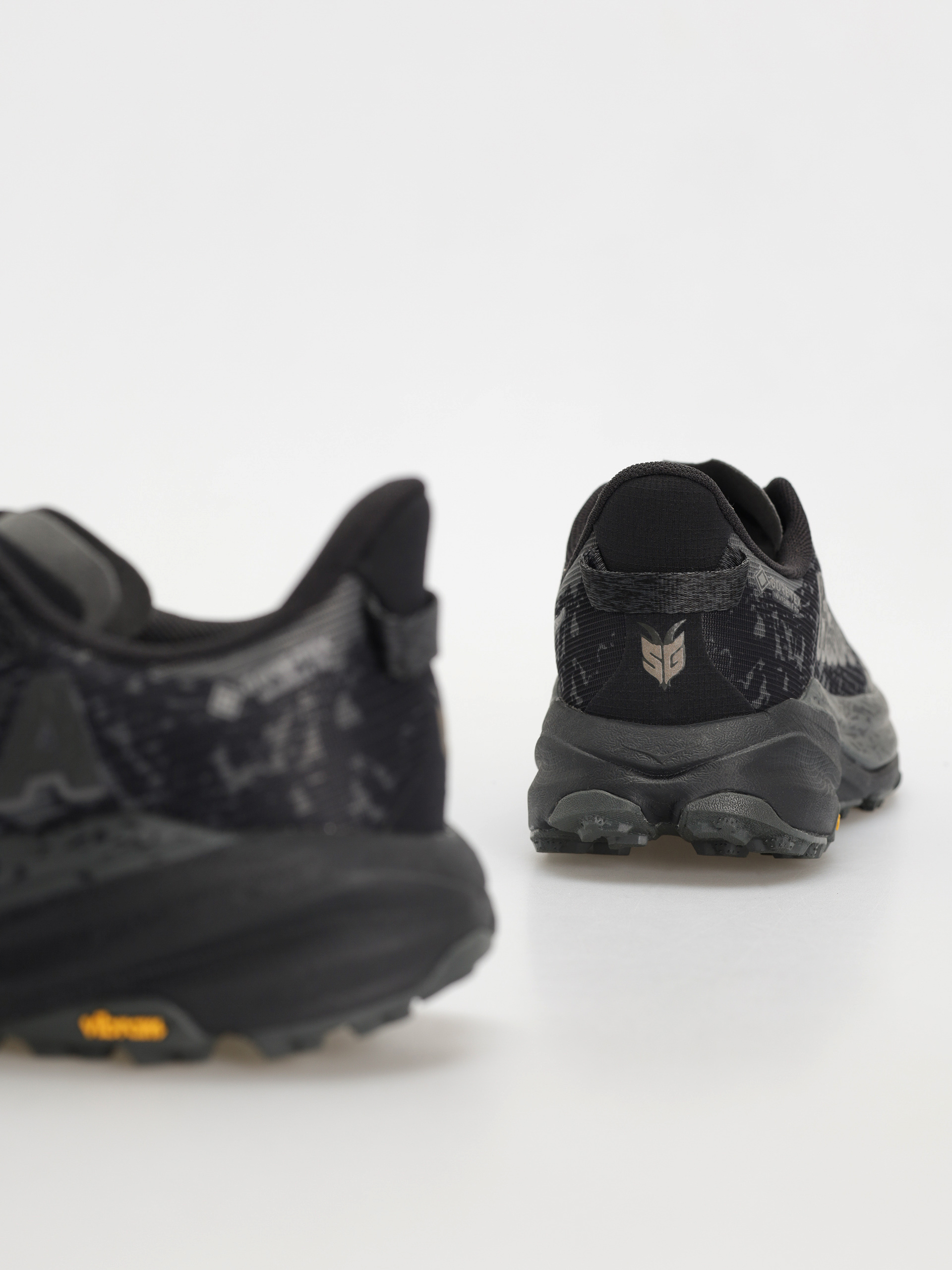 Взуття Hoka Speedgoat 6 (black/outer orbit)