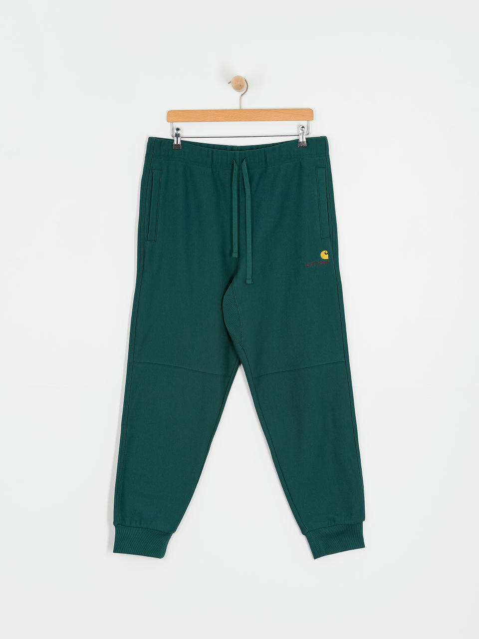 Штани Carhartt WIP American Script Jogging (malachite)