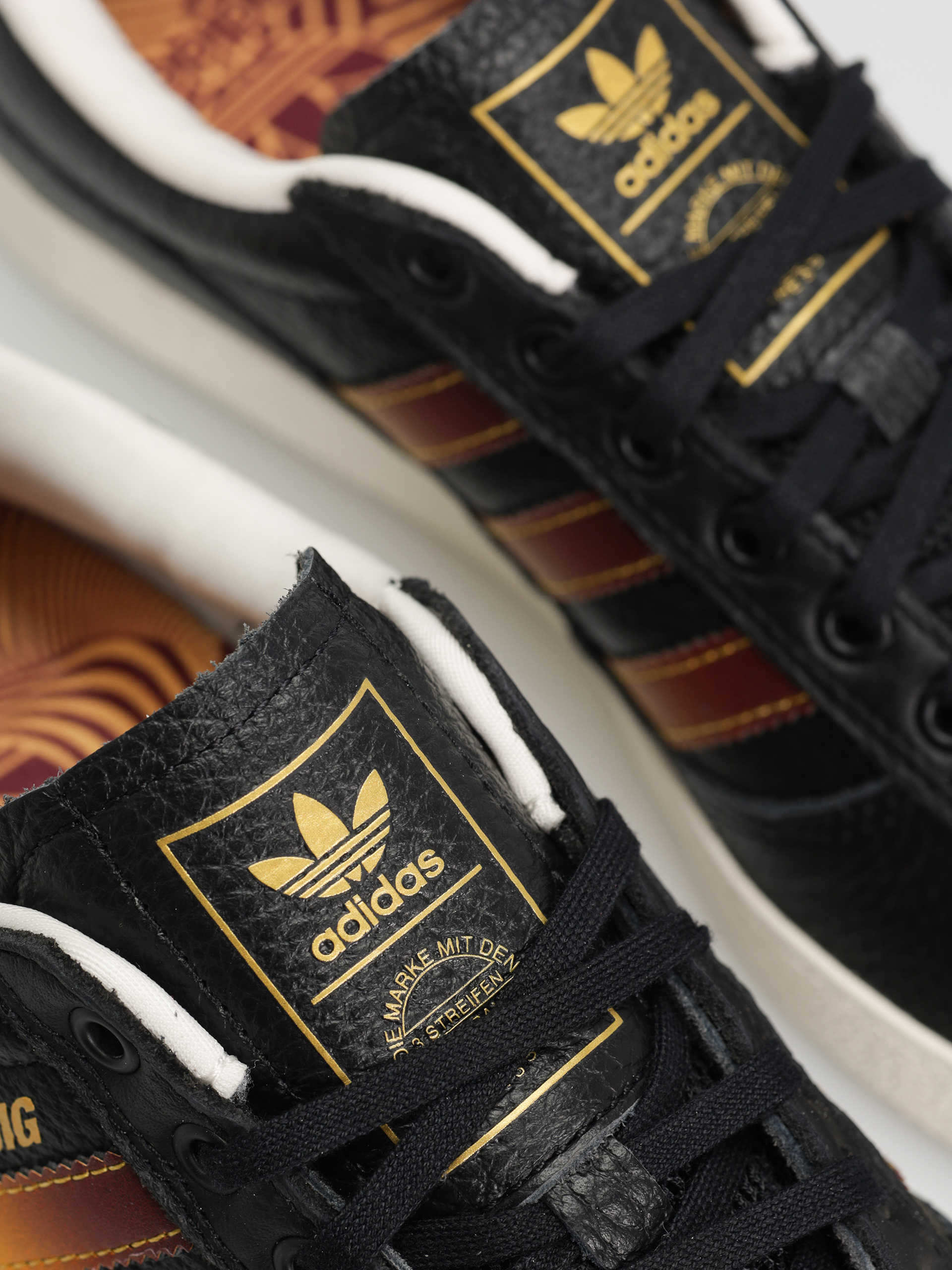 Взуття adidas Puig Indoor (cblack/shared/creyel)