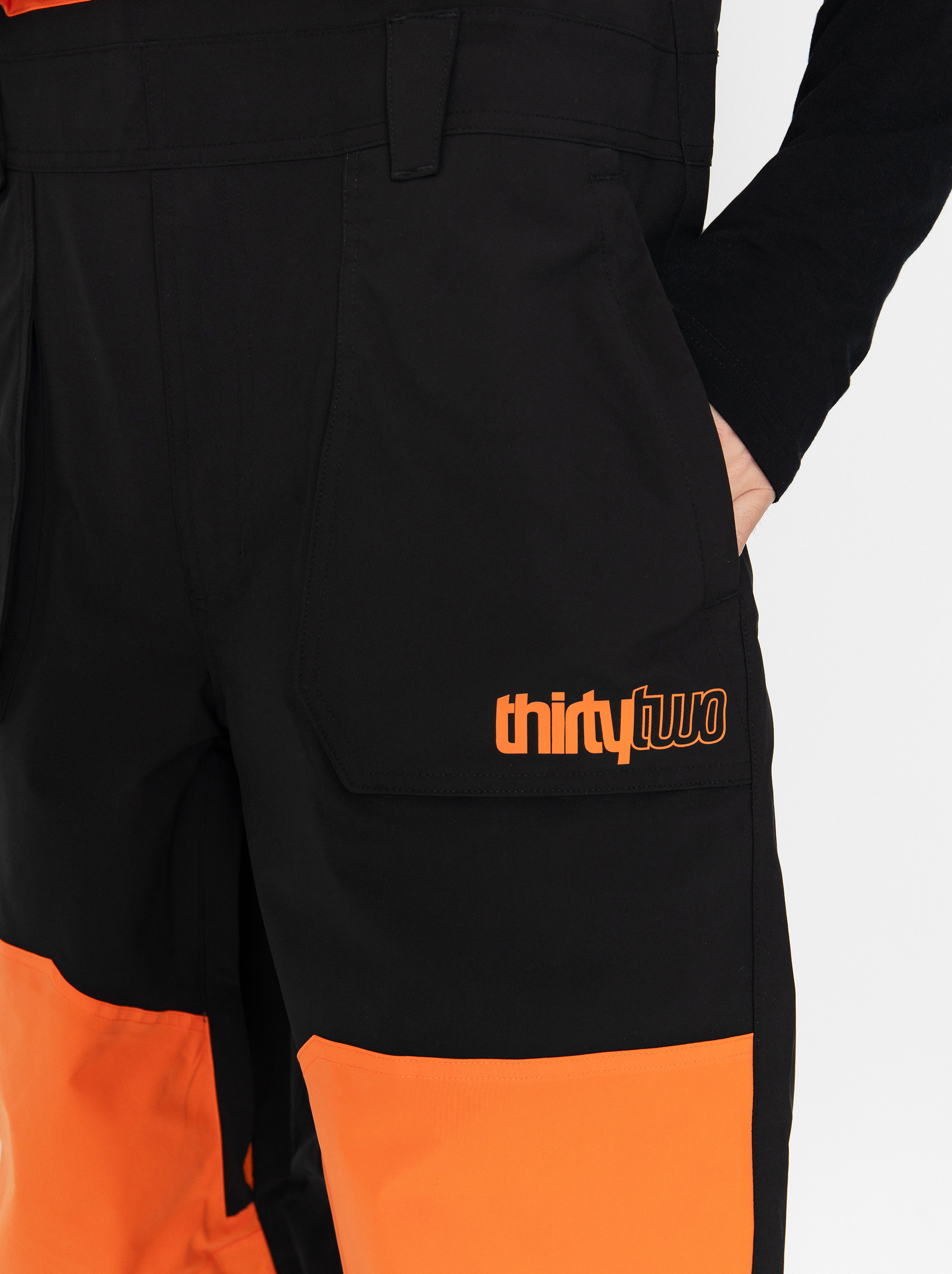 Чоловічі Сноубордичні штани ThirtyTwo Basement Bib (black/orange)