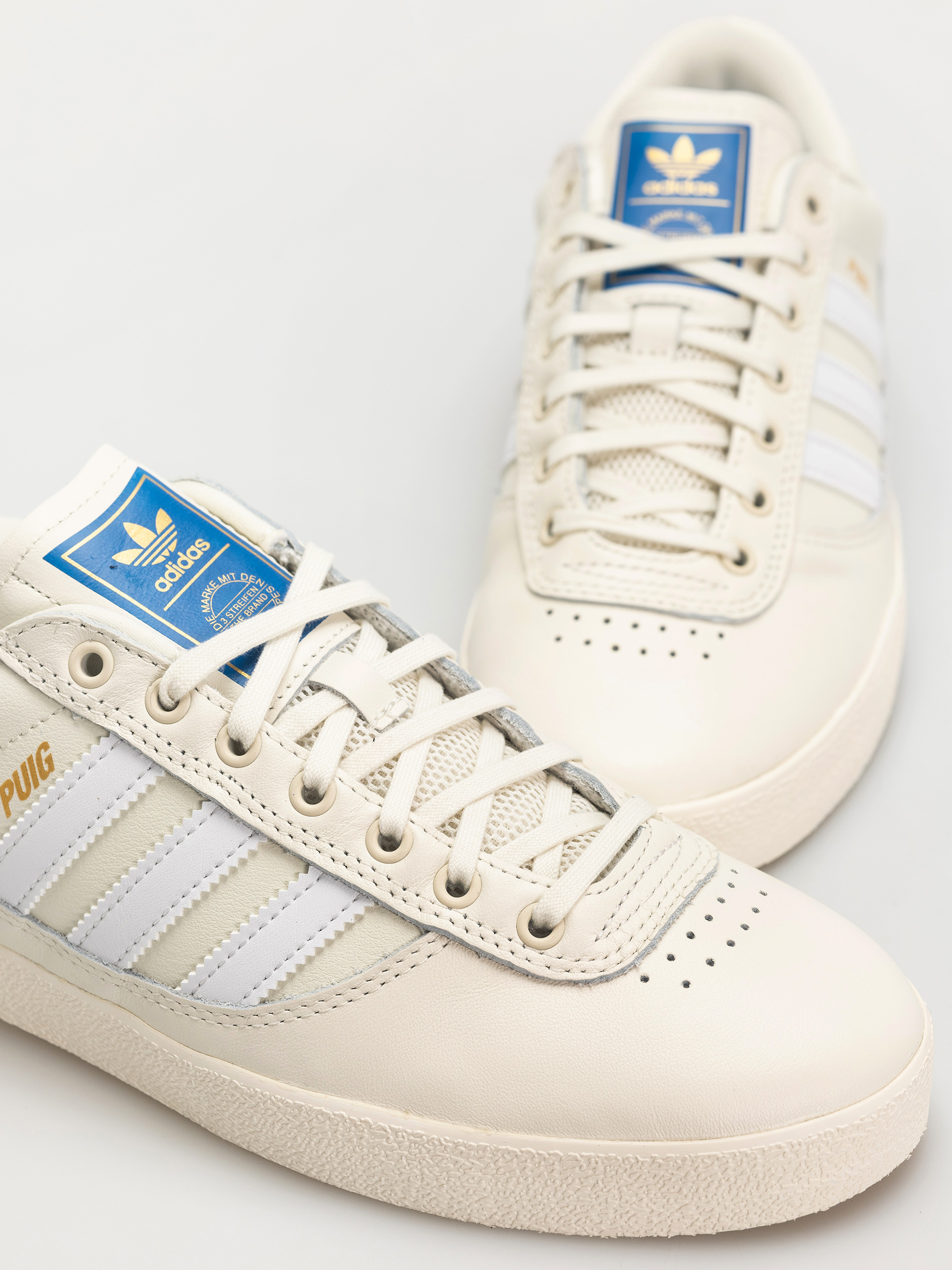 Взуття adidas Puig Indoor (owhite/ftwwht/blubir)