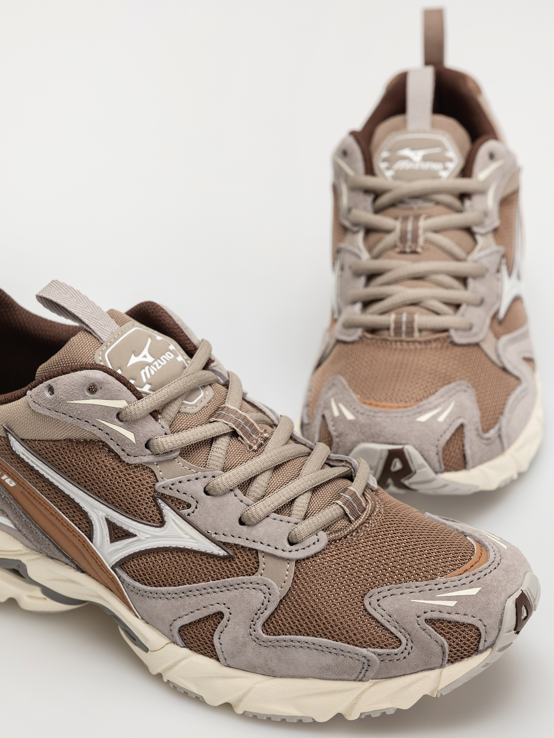 Взуття Mizuno Wave Rider 10 (fossil/white/thrush)
