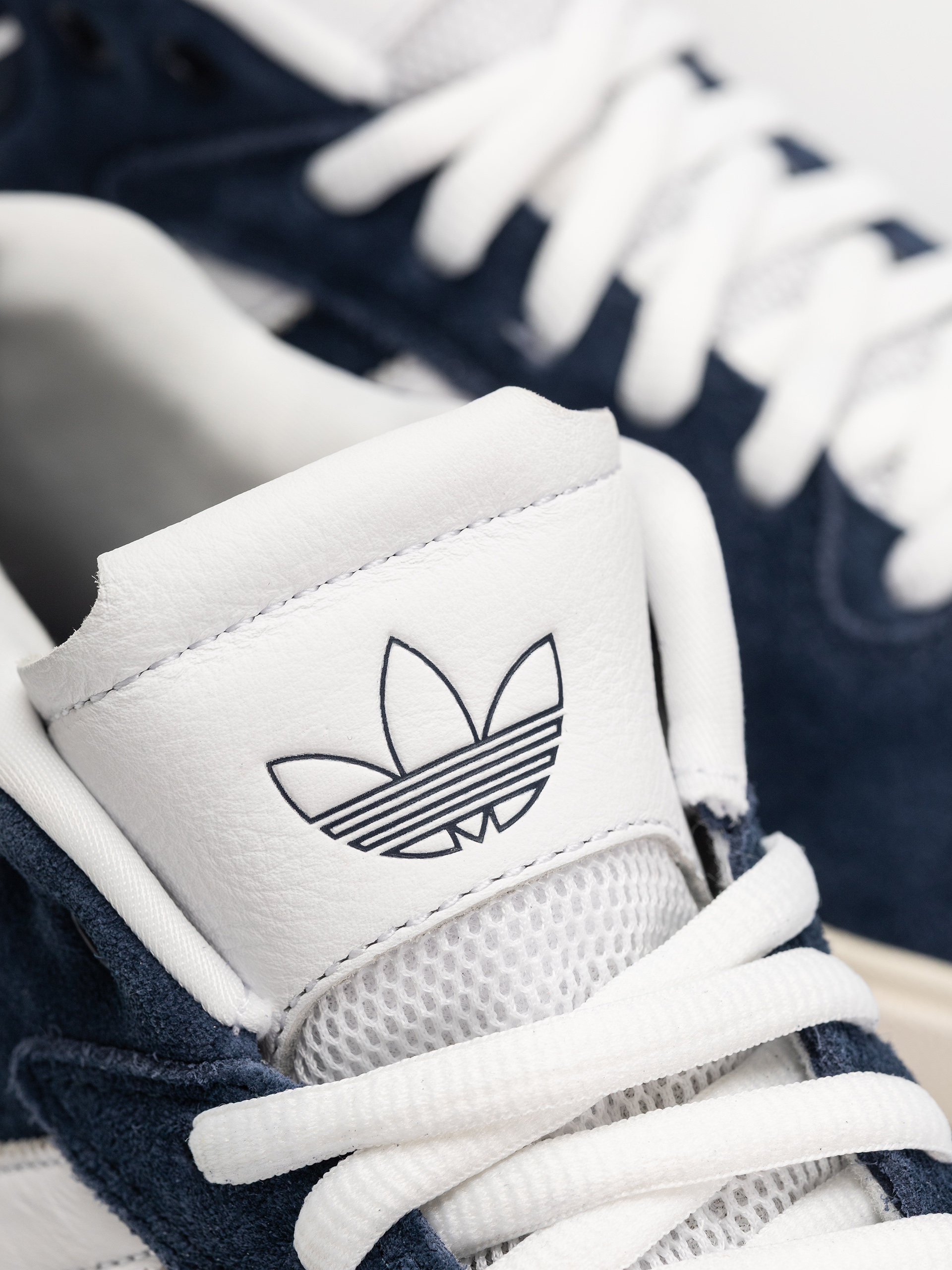 Взуття adidas Tyshawn (conavy/ftwwht/cwhite)