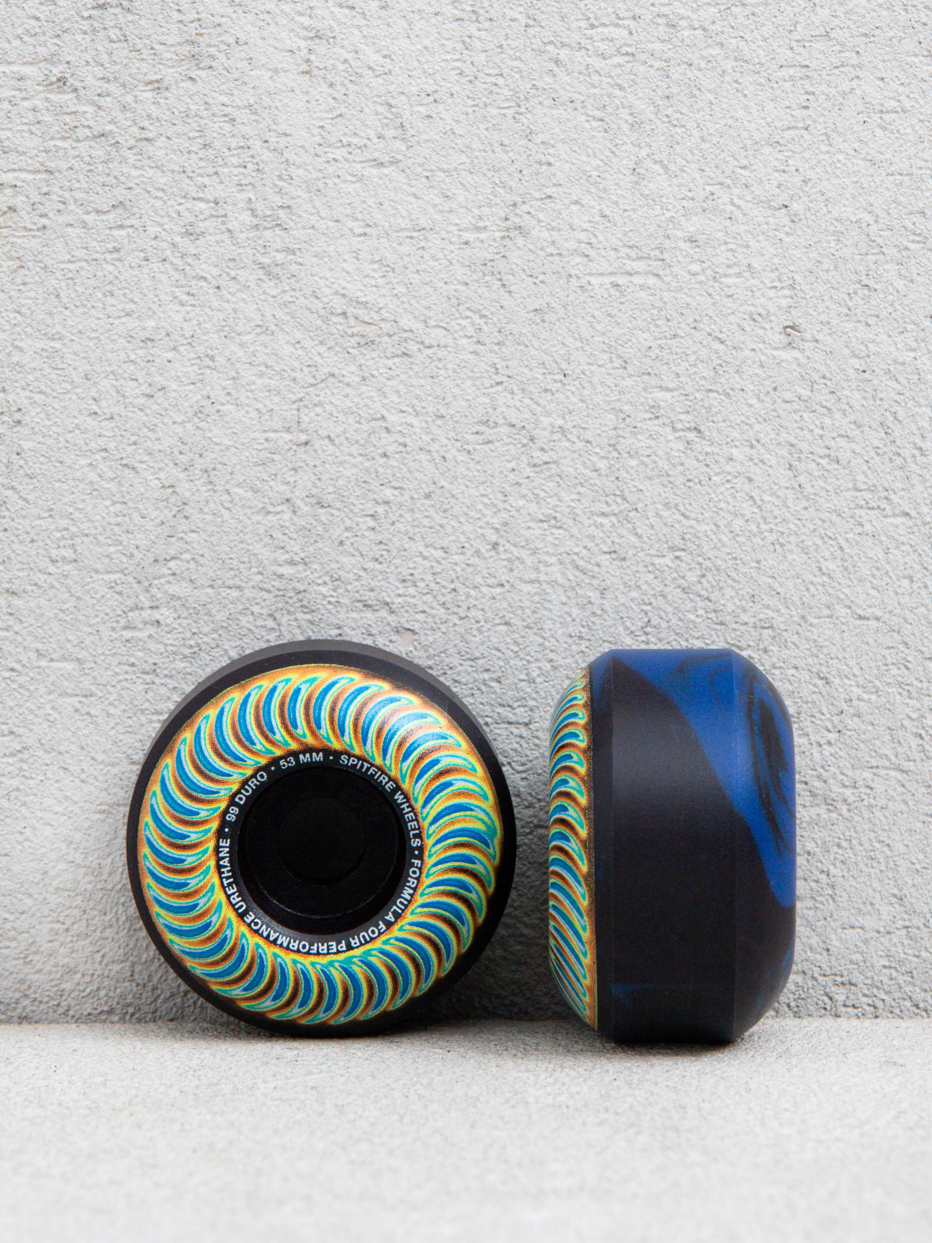 Колеса Spitfire F4 99D Radioactive Classic (black/blue swirl)