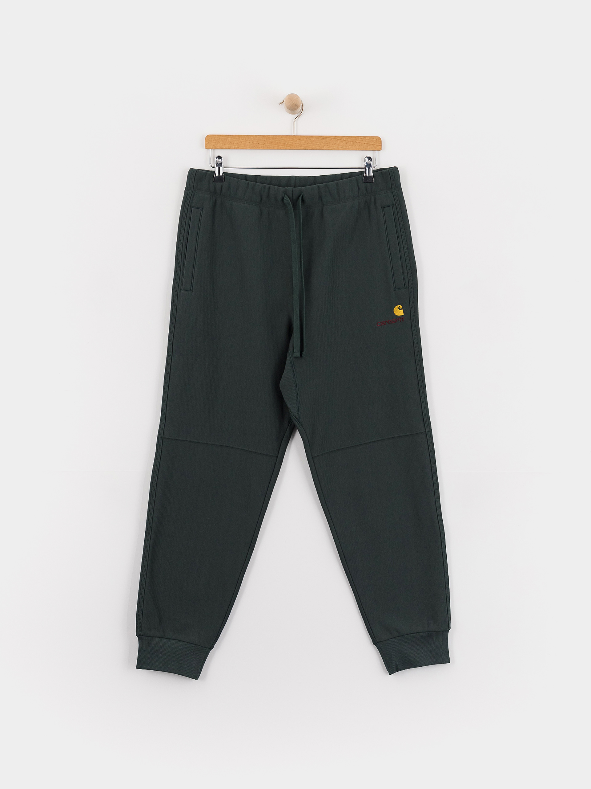 Штани Carhartt WIP American Script Jogging (kale green)