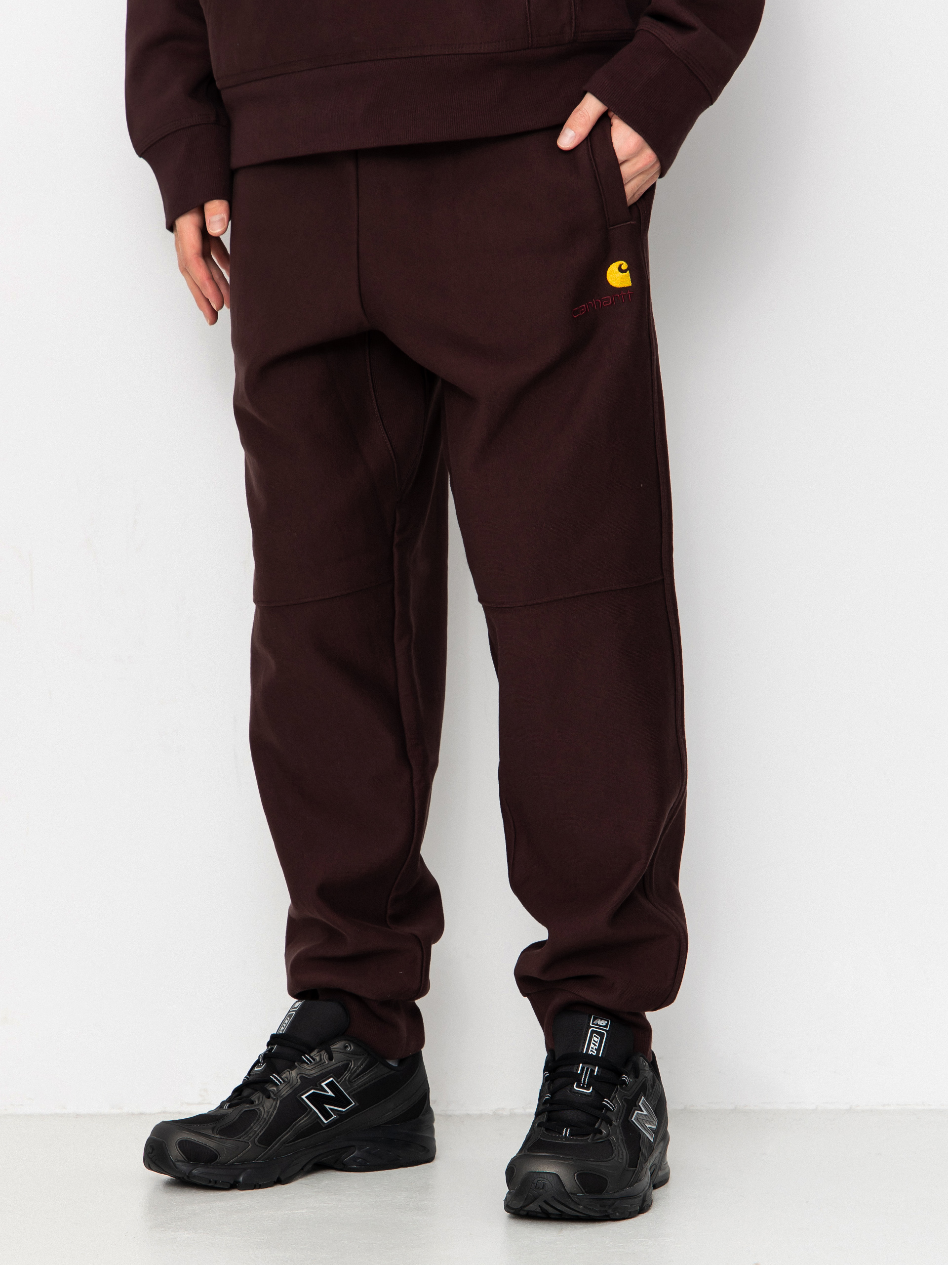 Штани Carhartt WIP American Script Jogging (palisander)