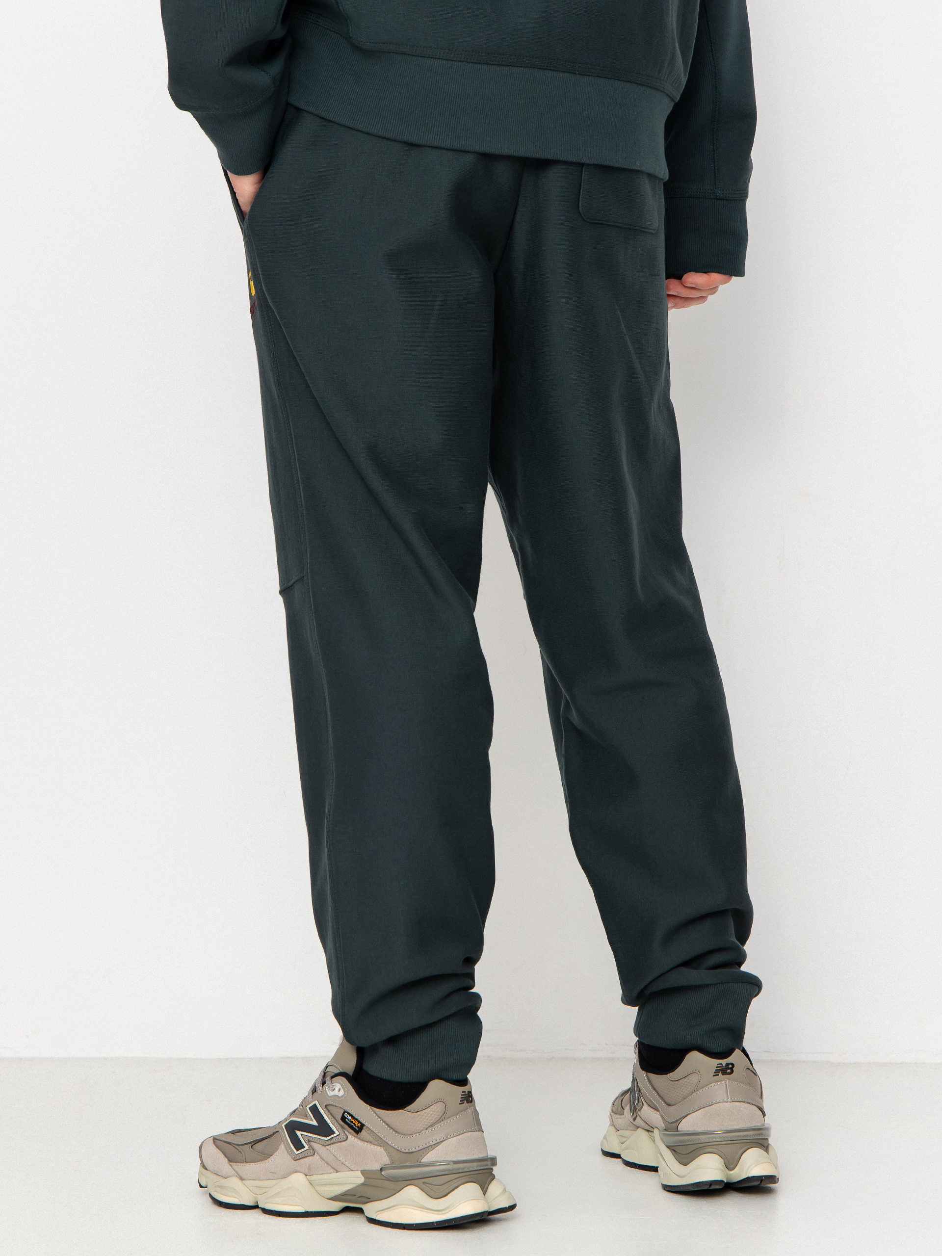 Штани Carhartt WIP American Script Jogging (kale green)