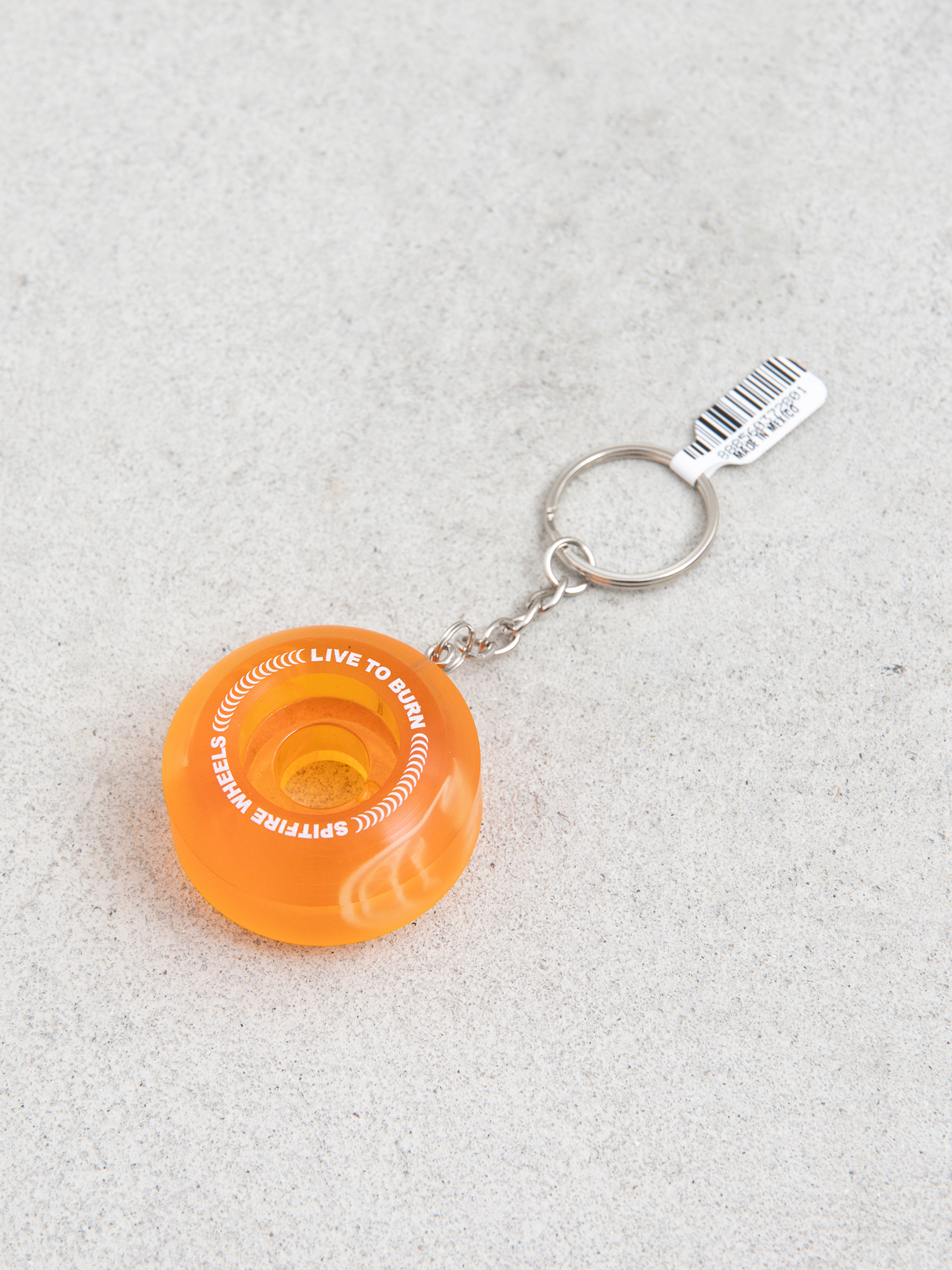 u0411u0440u0435u043bu043eu043a u0434u043bu044f u043au043bu044eu0447u0456u0432 Spitfire Wheel Keychain (transparent orange)