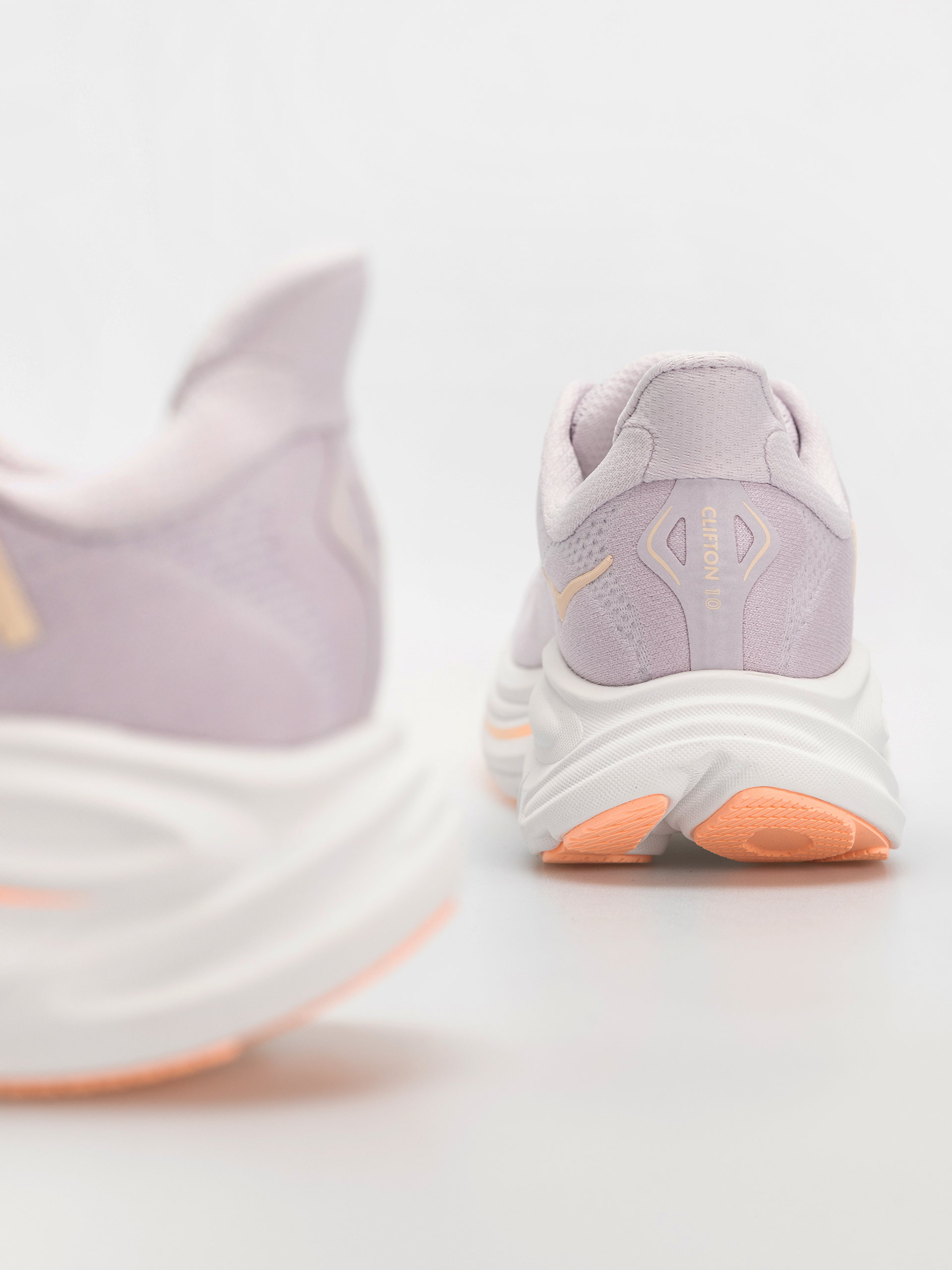 Взуття Hoka Clifton 10 Wmn (lilac cream/tangerine glow)