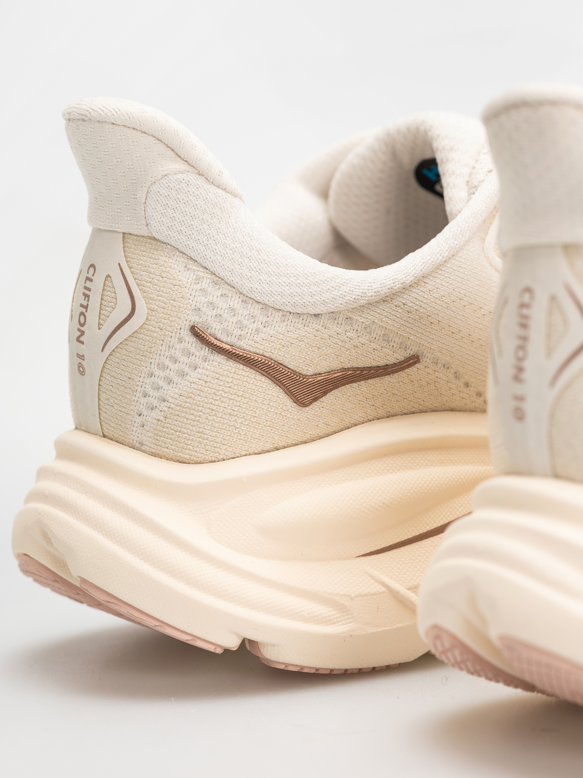 Взуття Hoka Clifton 10 Wmn (alabaster/rose gold)
