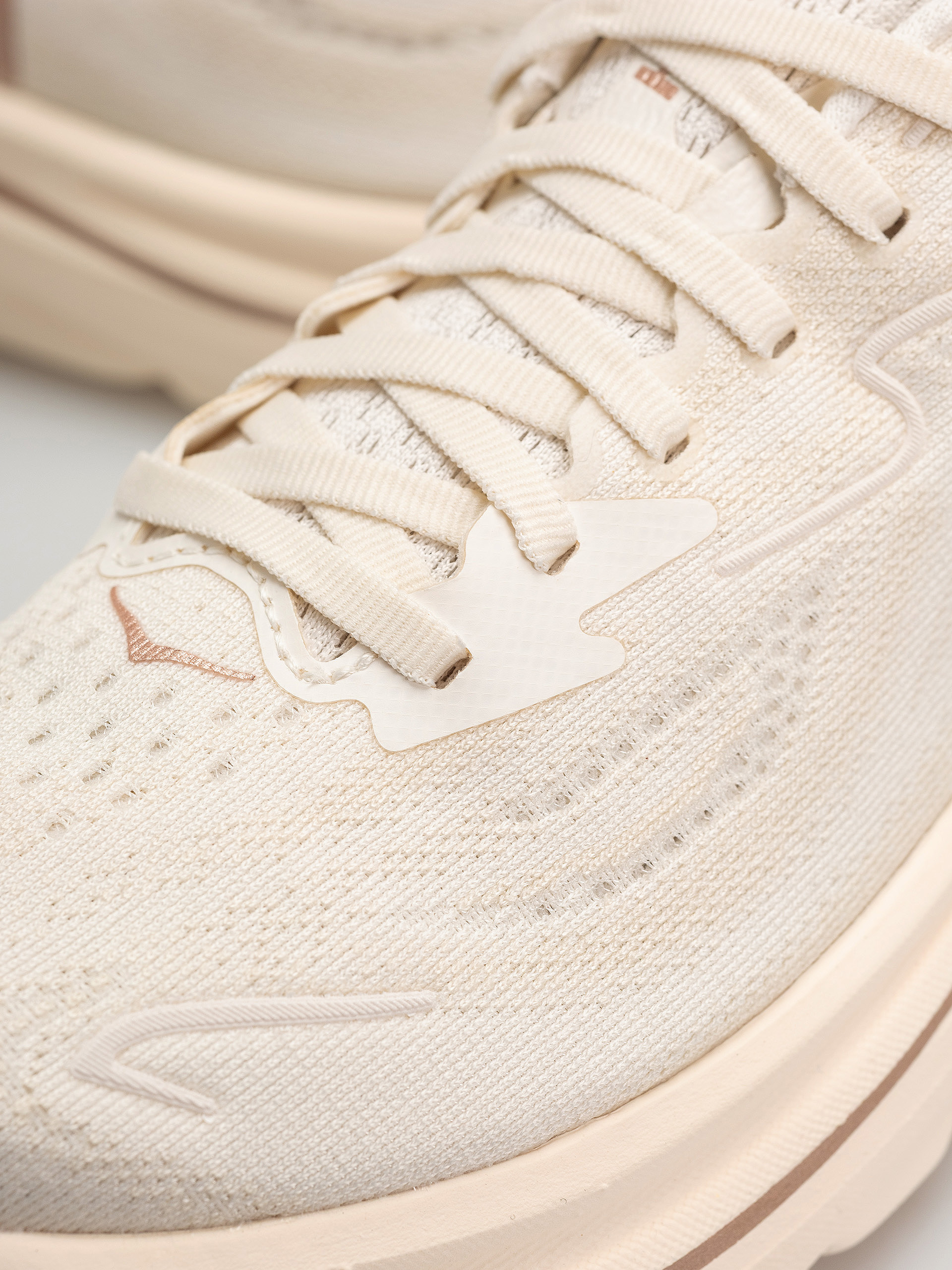 Взуття Hoka Clifton 10 Wmn (alabaster/rose gold)