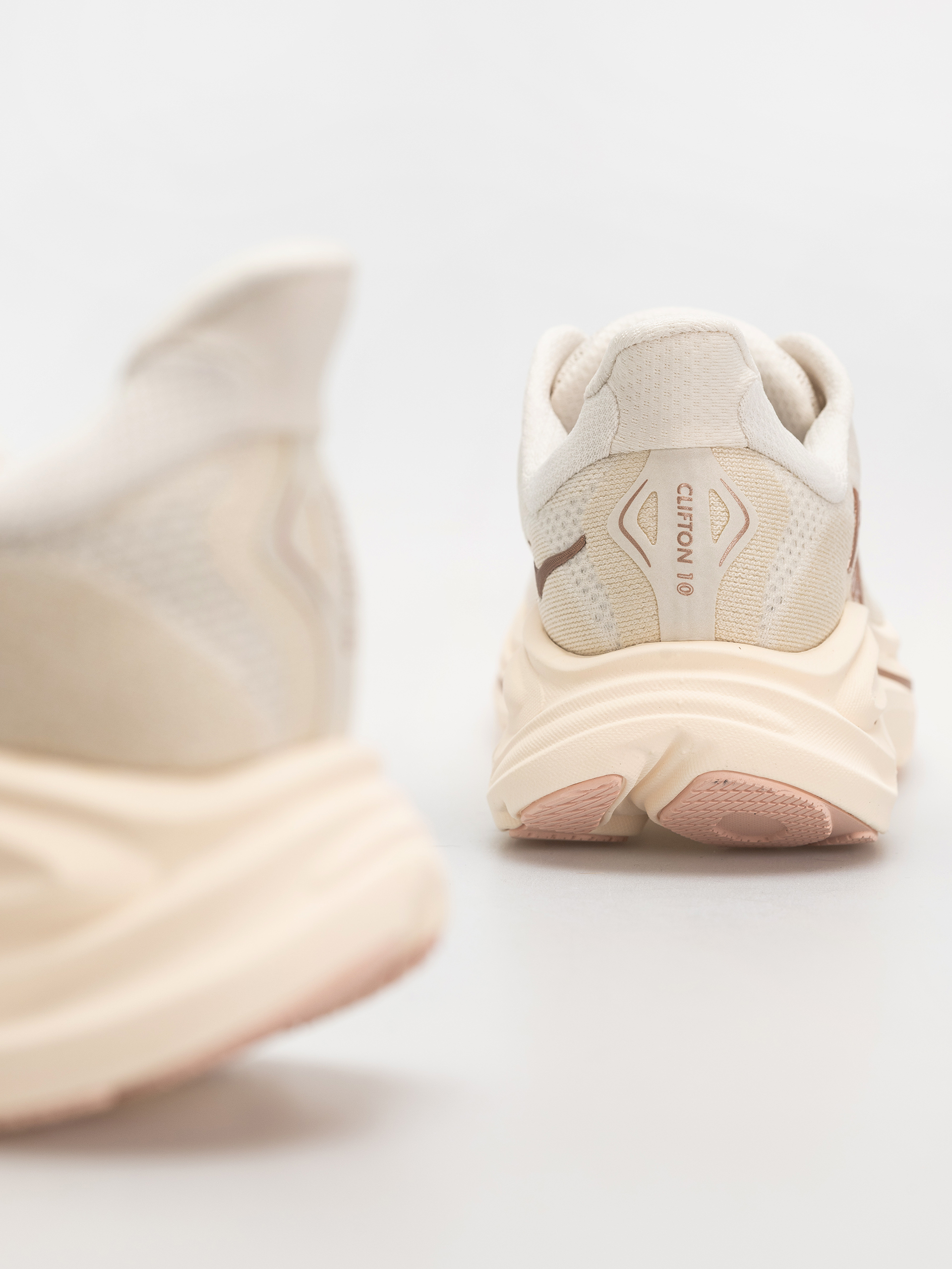 Взуття Hoka Clifton 10 Wmn (alabaster/rose gold)