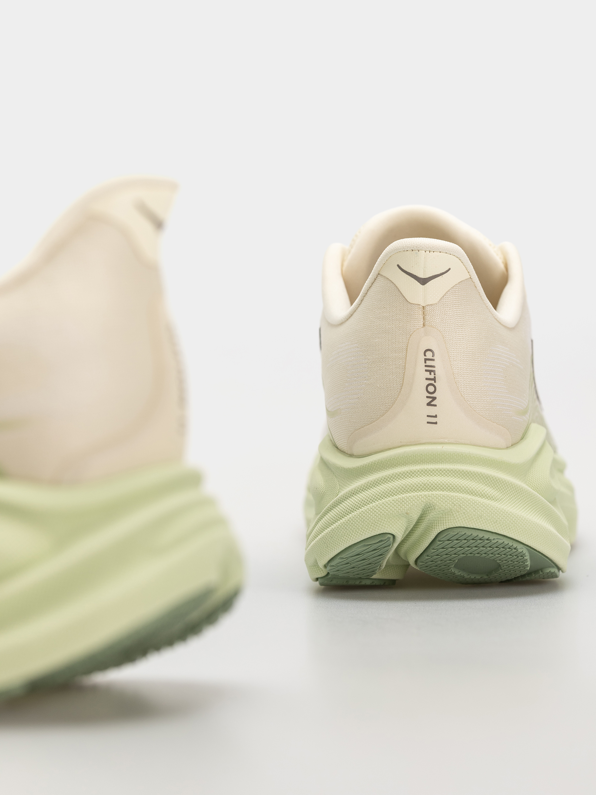 Взуття Hoka Clifton 11 Wmn (alabaster/morning dew)